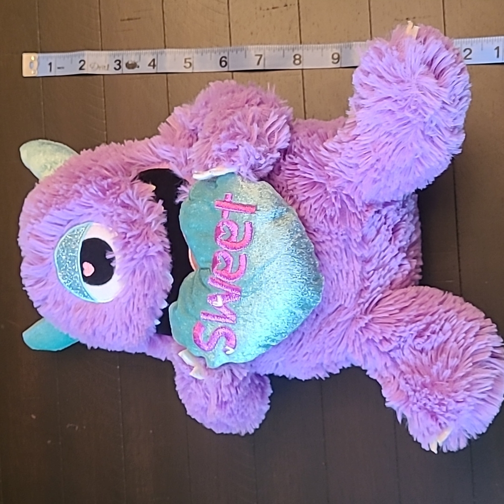 Purple One-Eyed Monster Holding Sweet Heart